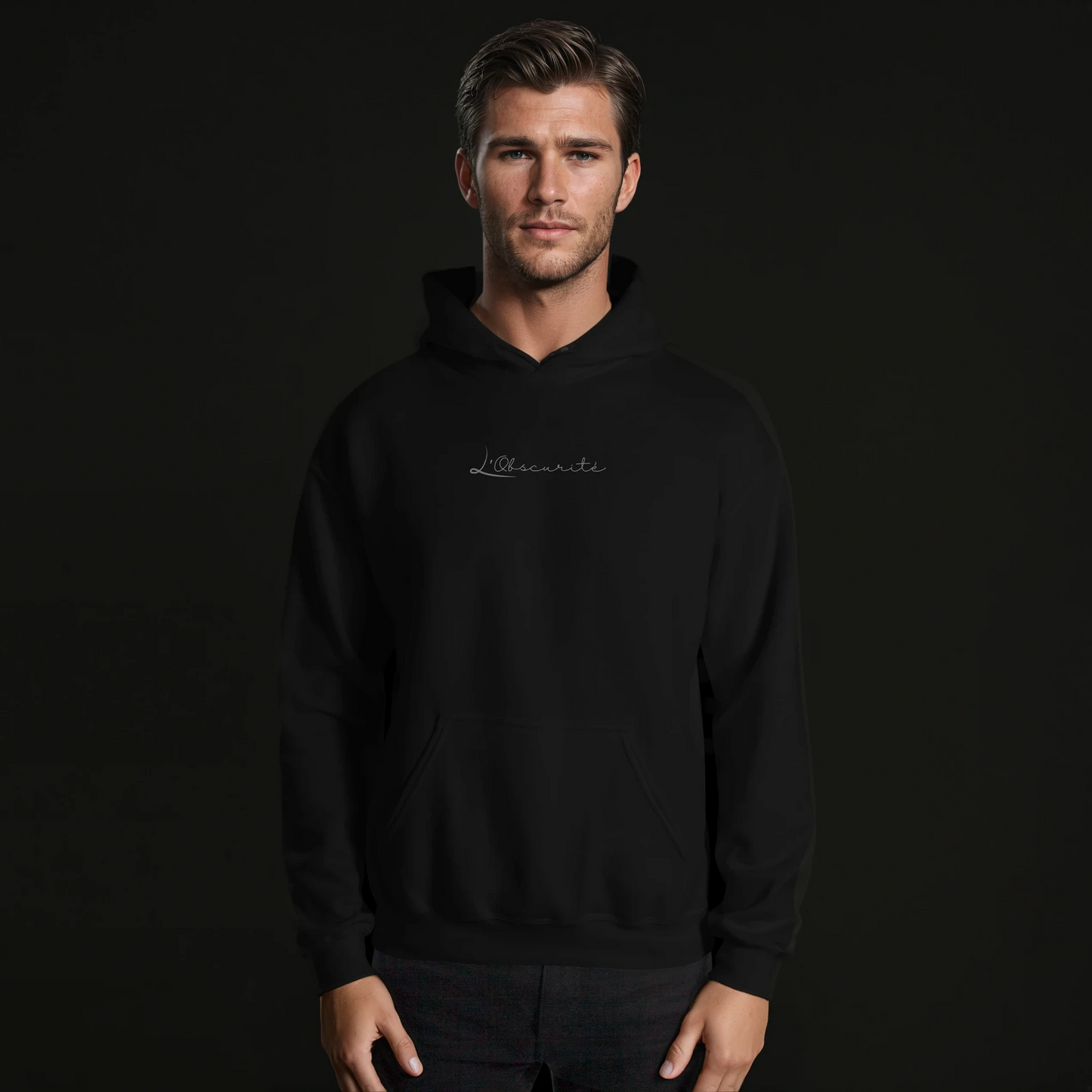man wearing a black hoodie minimalistic , an essential in your wardrobe