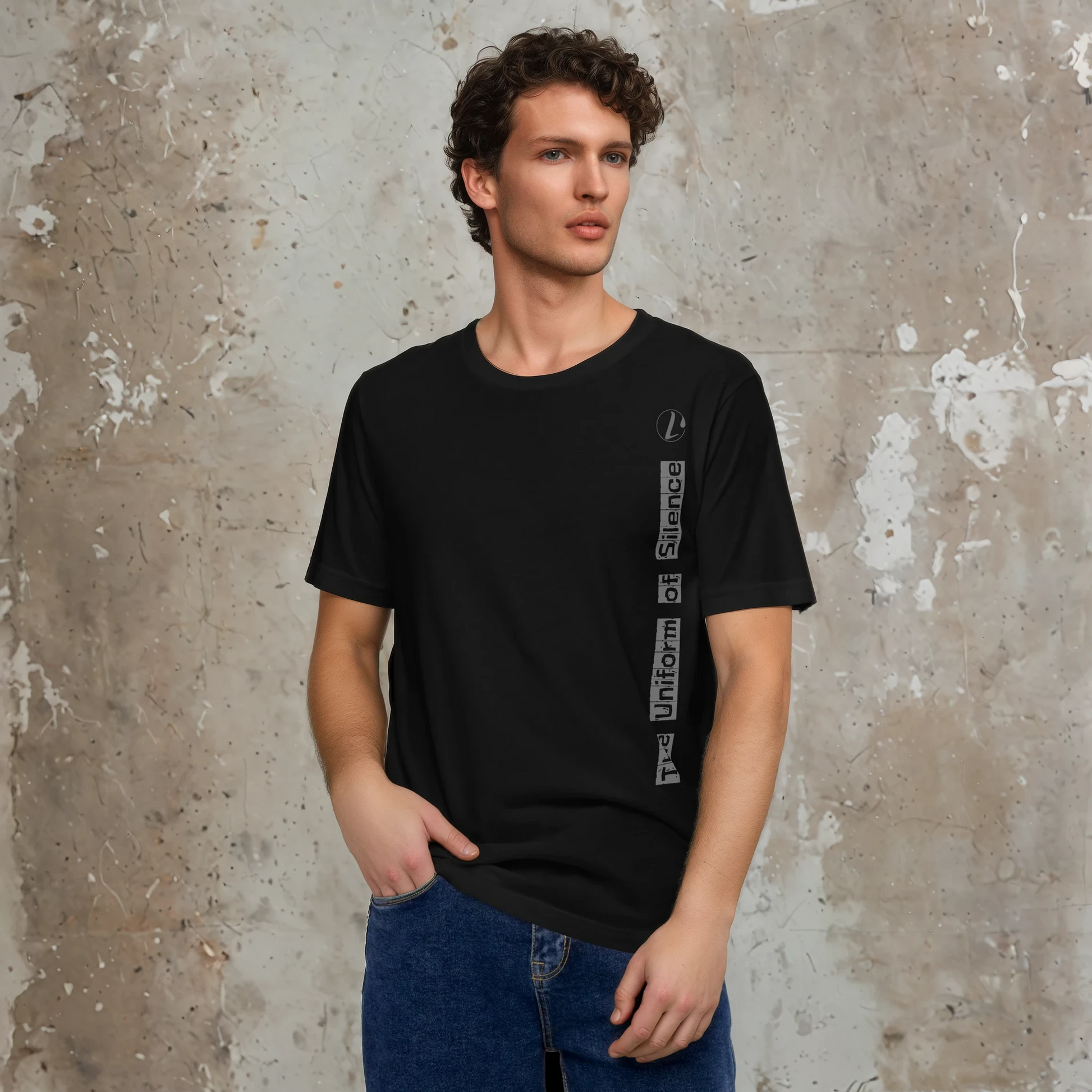 Man wearing a black t-shirt with text the uniform of silence